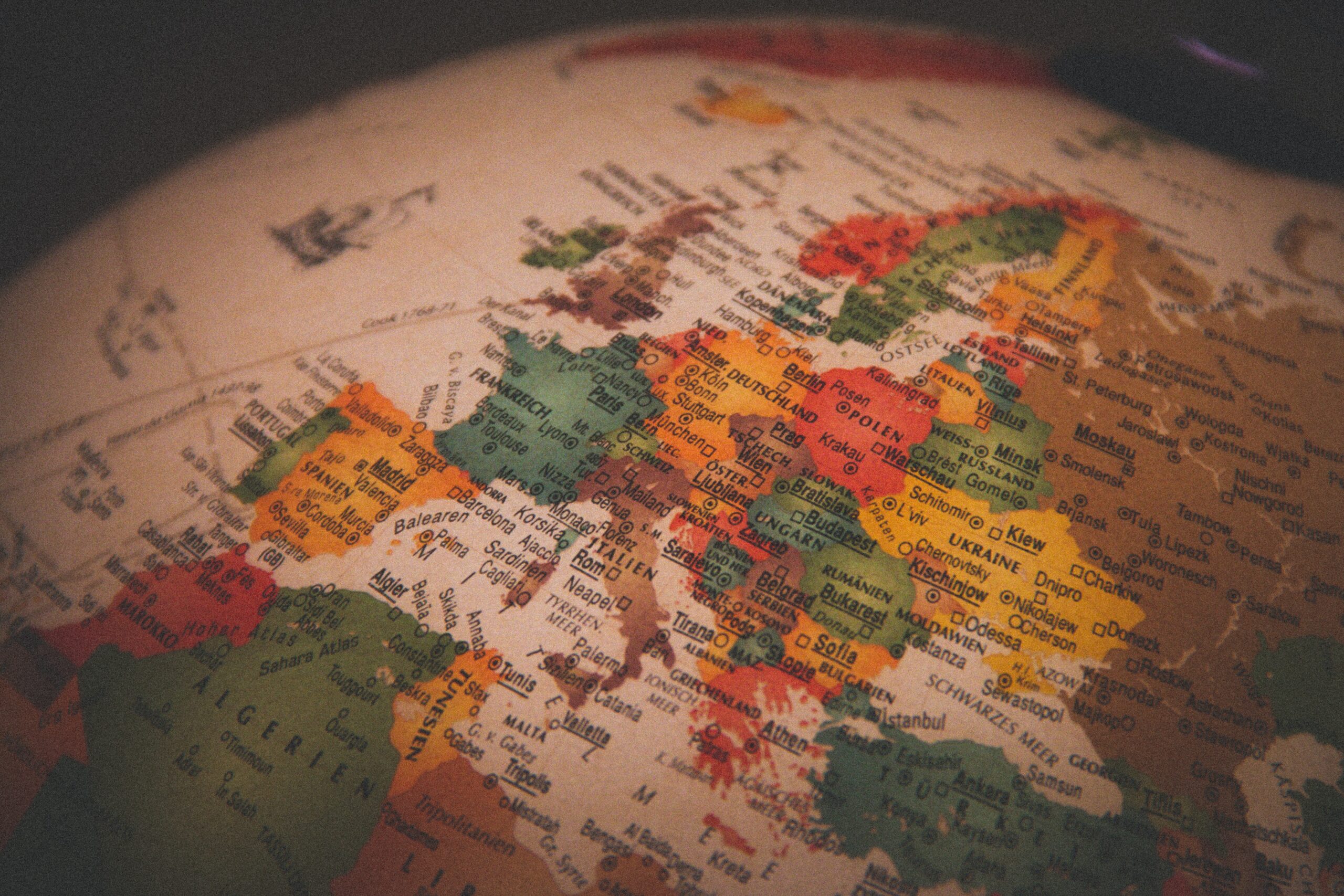 Sepia toned globe map focused on Europe